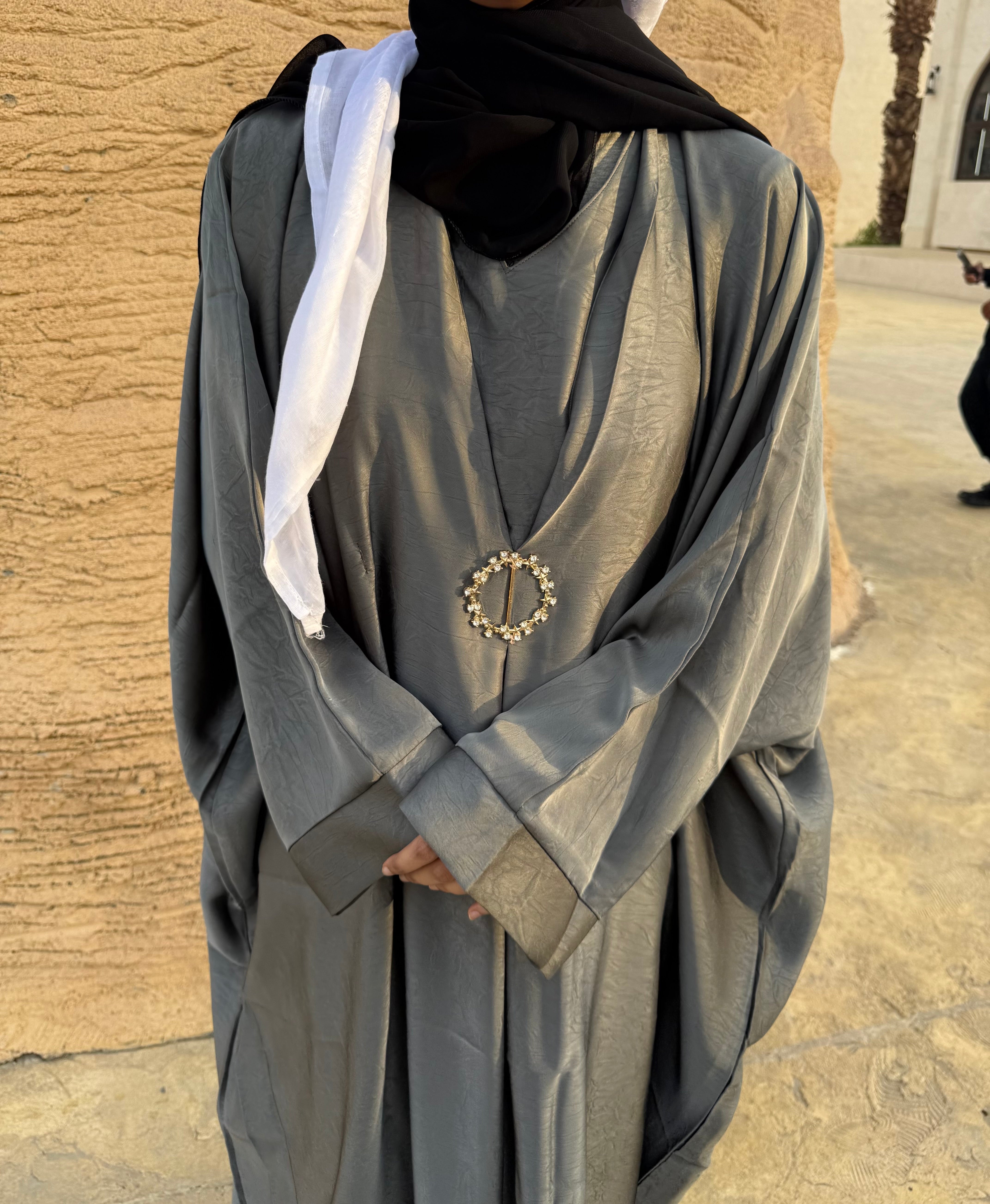 Grey brooch abaya with hijab