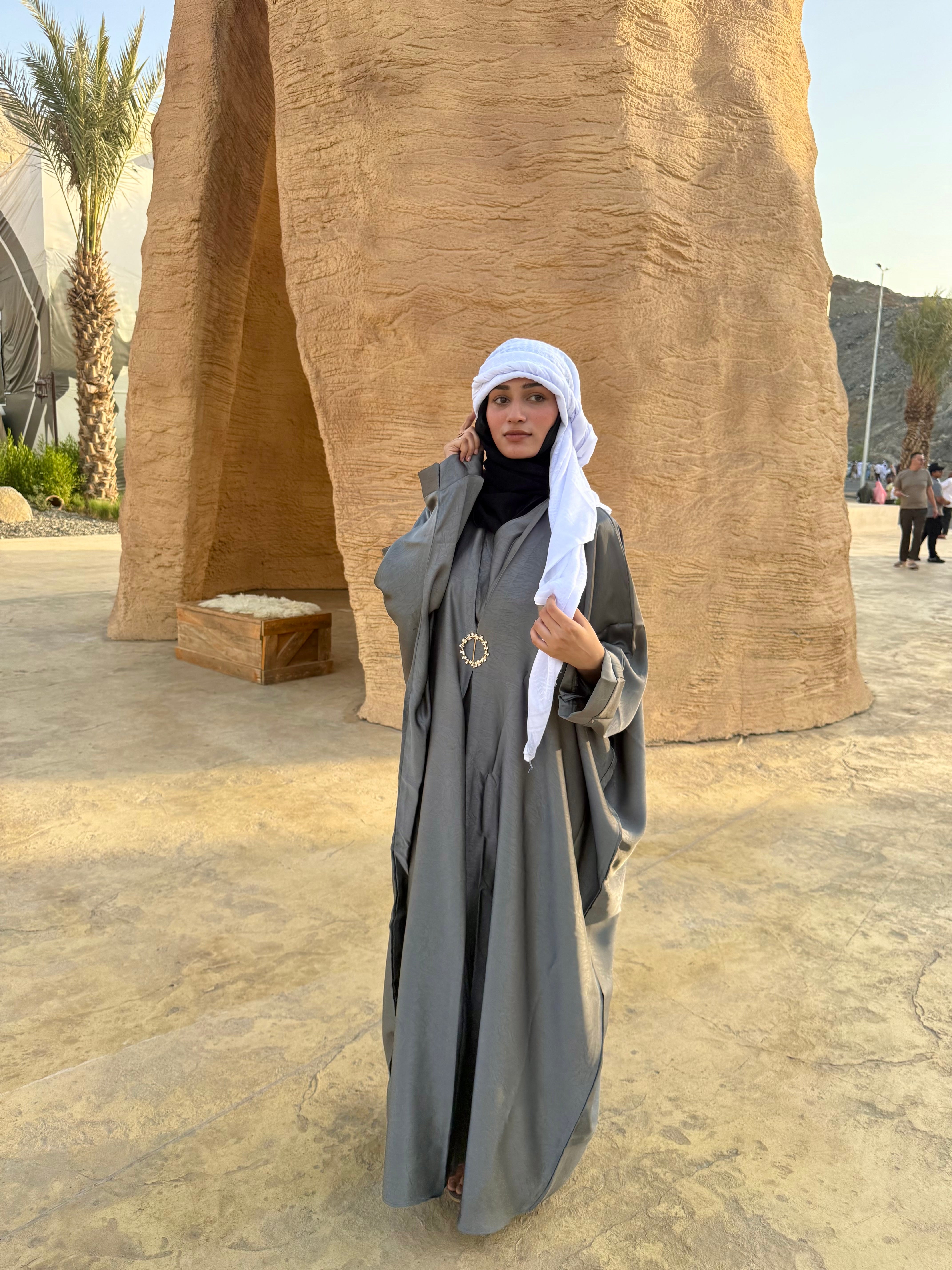 Grey brooch abaya with hijab