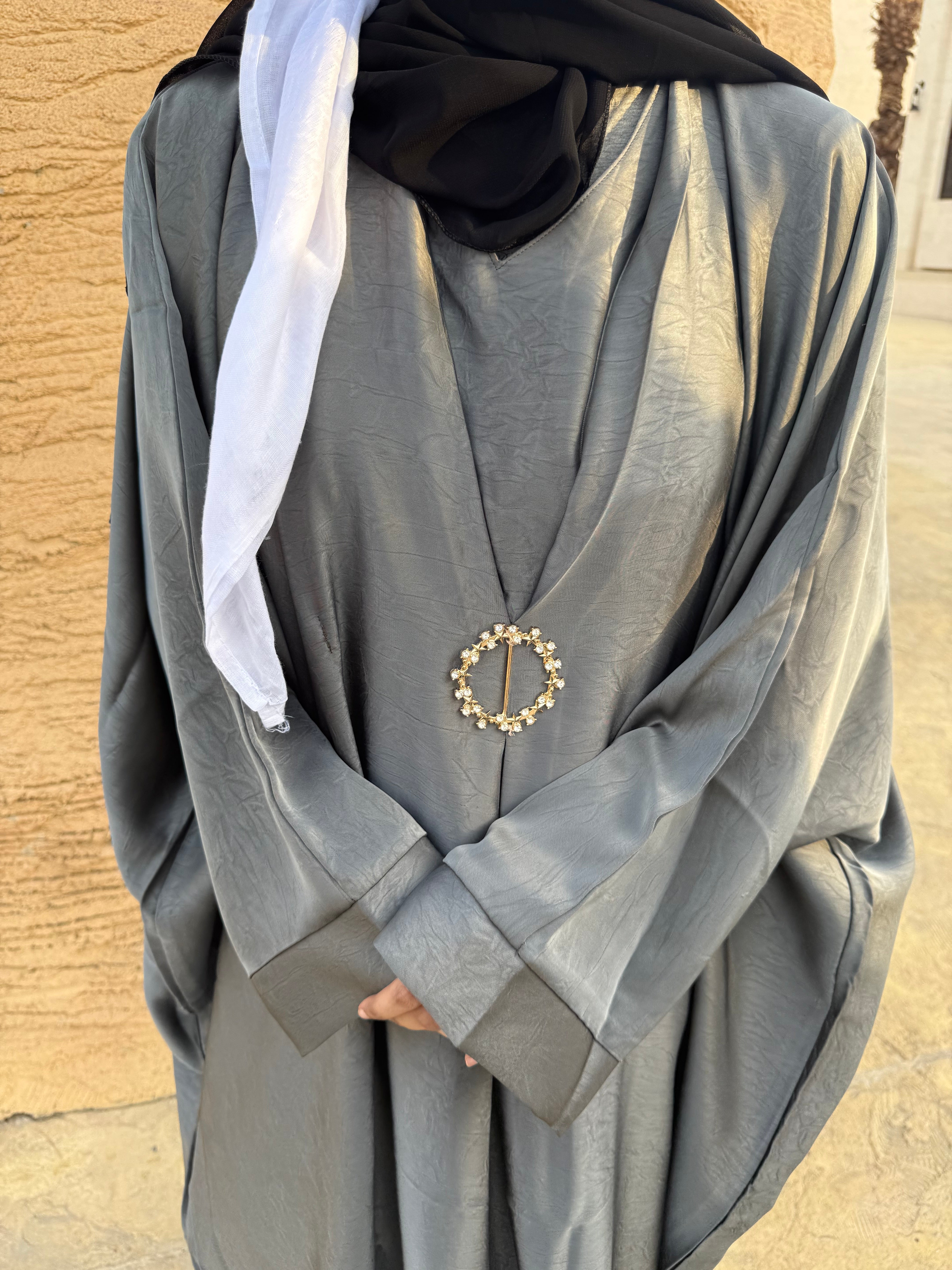 Grey brooch abaya with hijab