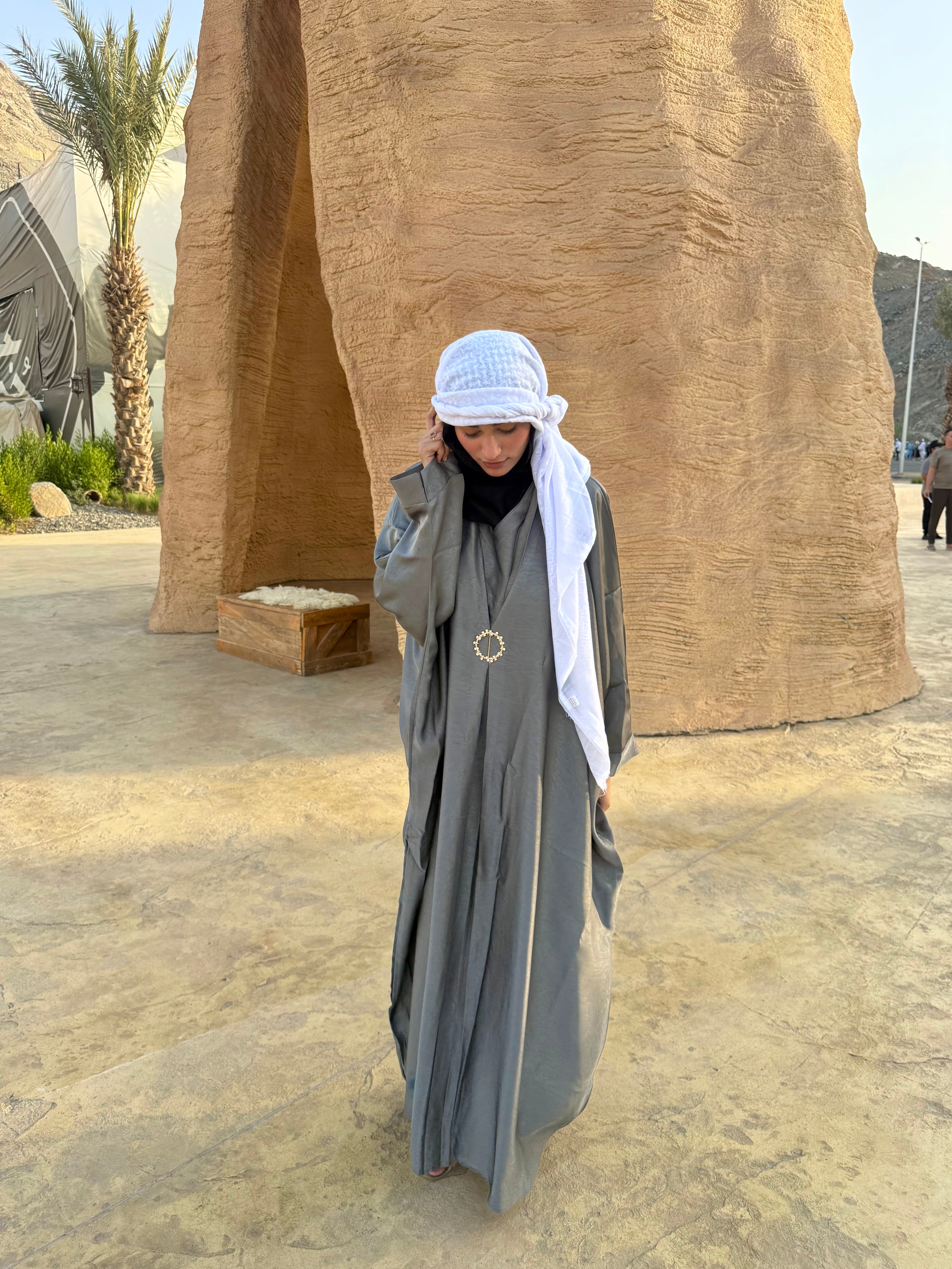 Grey brooch abaya with hijab