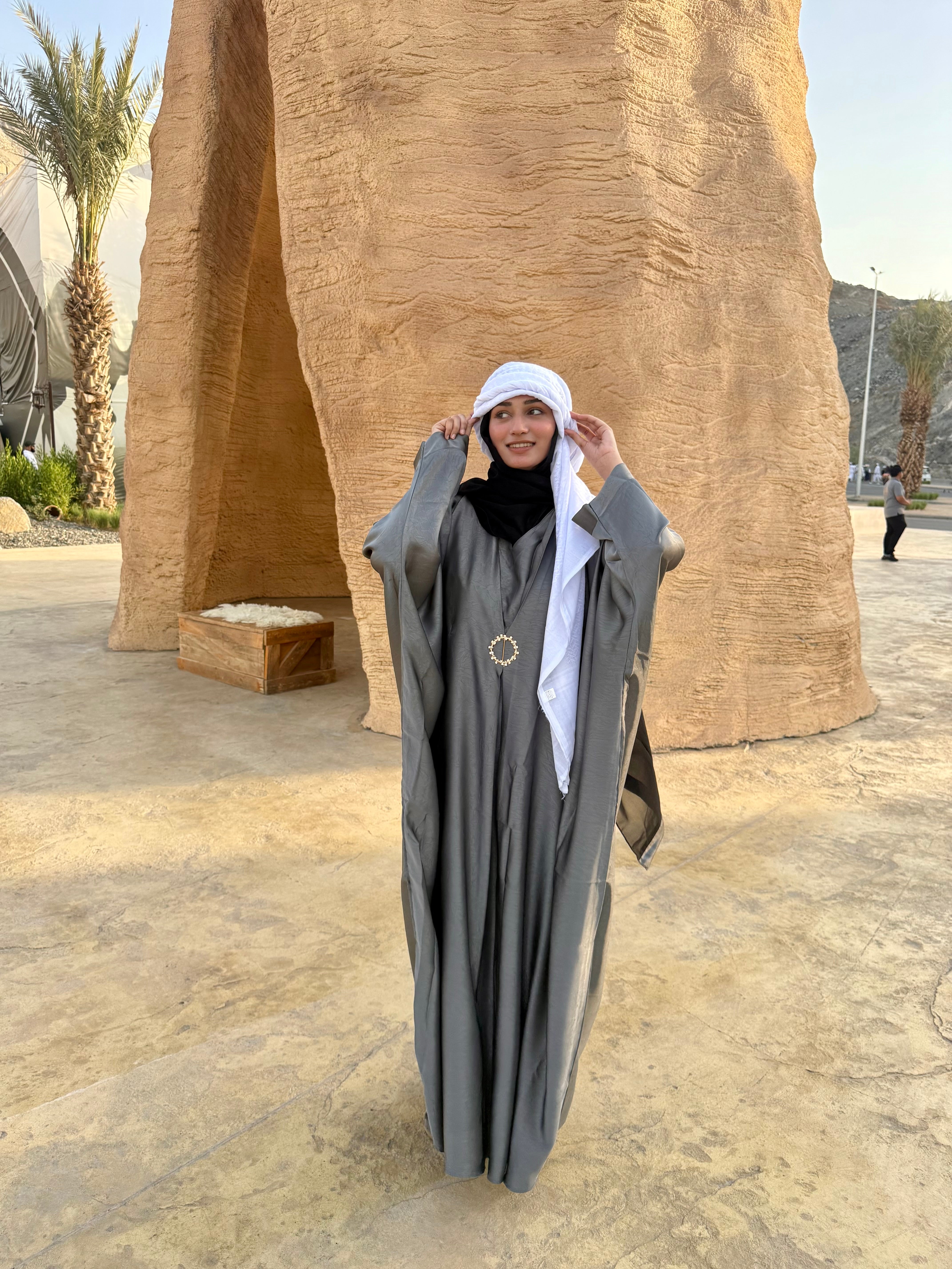 Grey brooch abaya with hijab