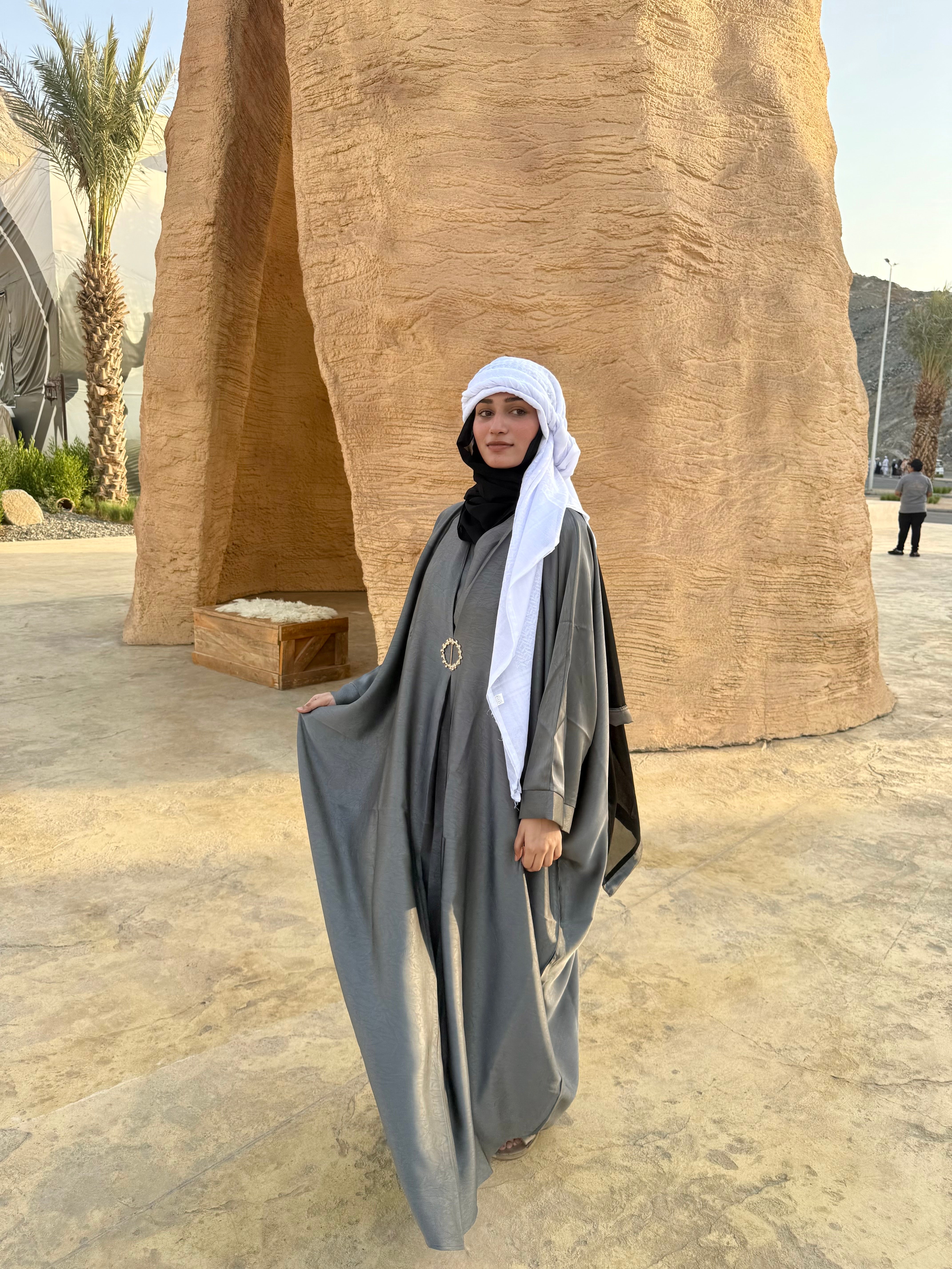 Grey brooch abaya with hijab