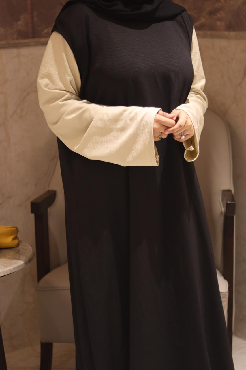 Black ribbed sleeveless inner slit