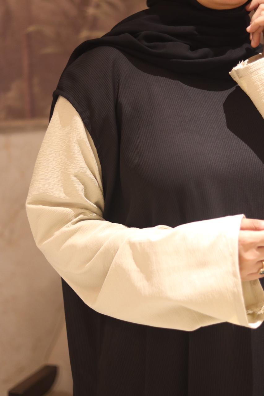 Black ribbed sleeveless inner slit